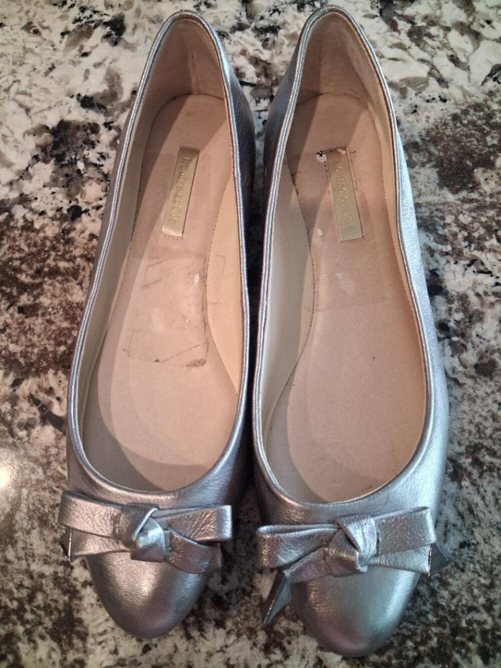 Louise et Cie silver metallic flats from Nordstrom's with bows. 8.5B